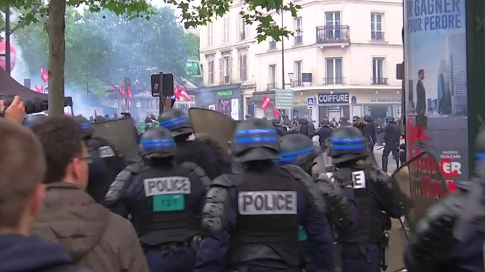 French Police Tear Gas Protesters In Paris Bbc News