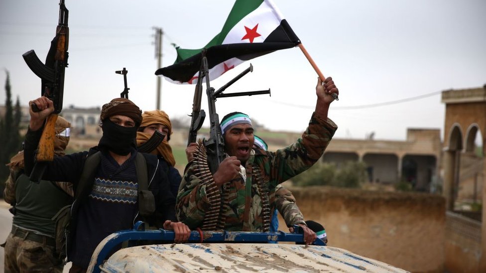 Rebeldes sirios apoyados por Turquía.