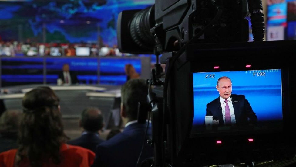 путін