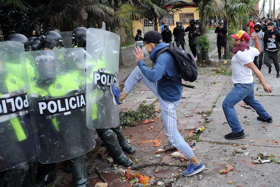 Demonstrators clash with the police during a protest