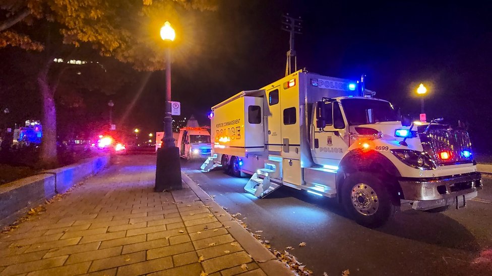 A police truck is parked near the National Assembly of Quebec, in Quebec City, early on 1 November, 2020.