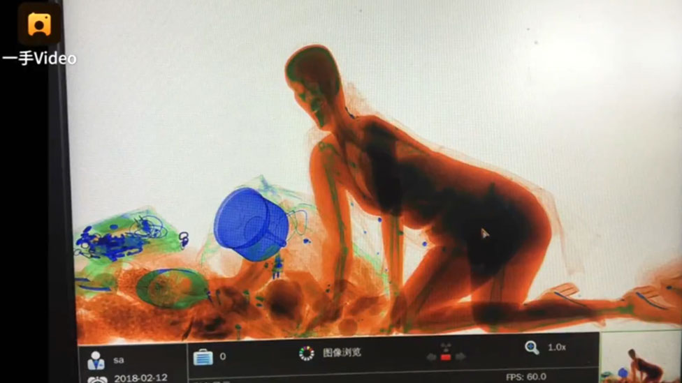 976px x 549px - Chinese woman joins handbag in X-ray machine - BBC News