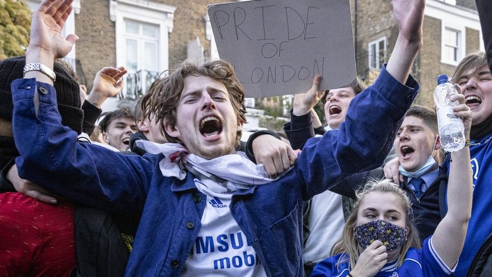 Chelsea fans celebrate the verdict
