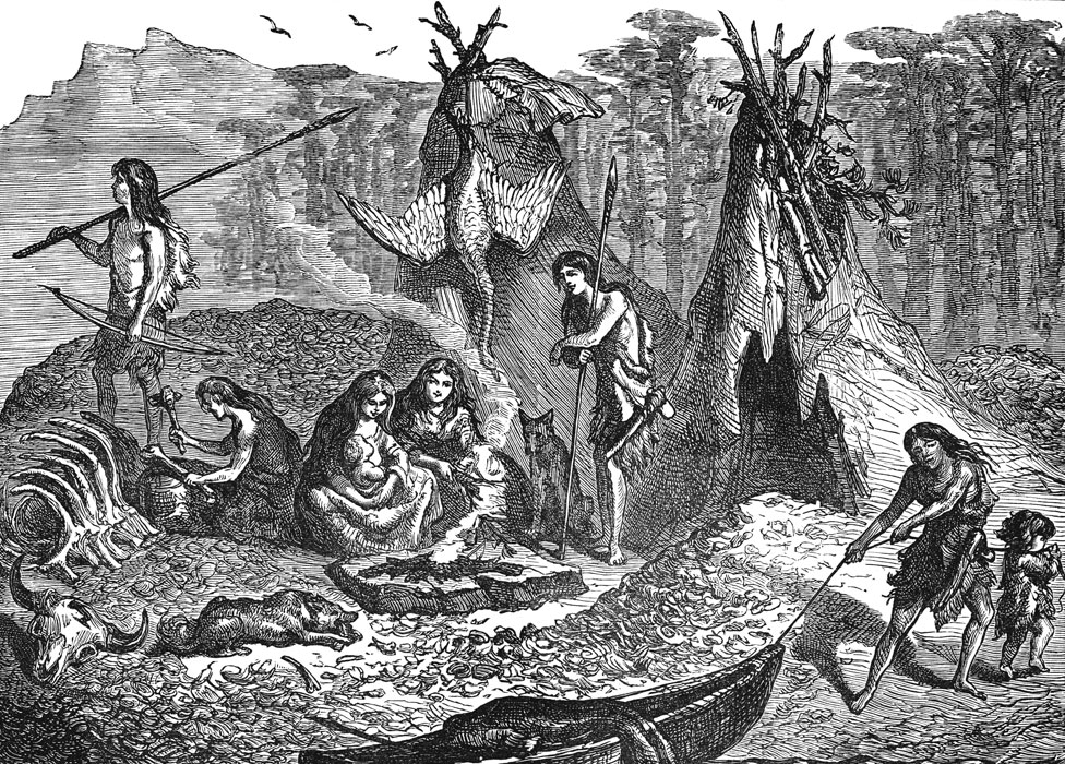Pueblos originarios sentados alrededor del fuego