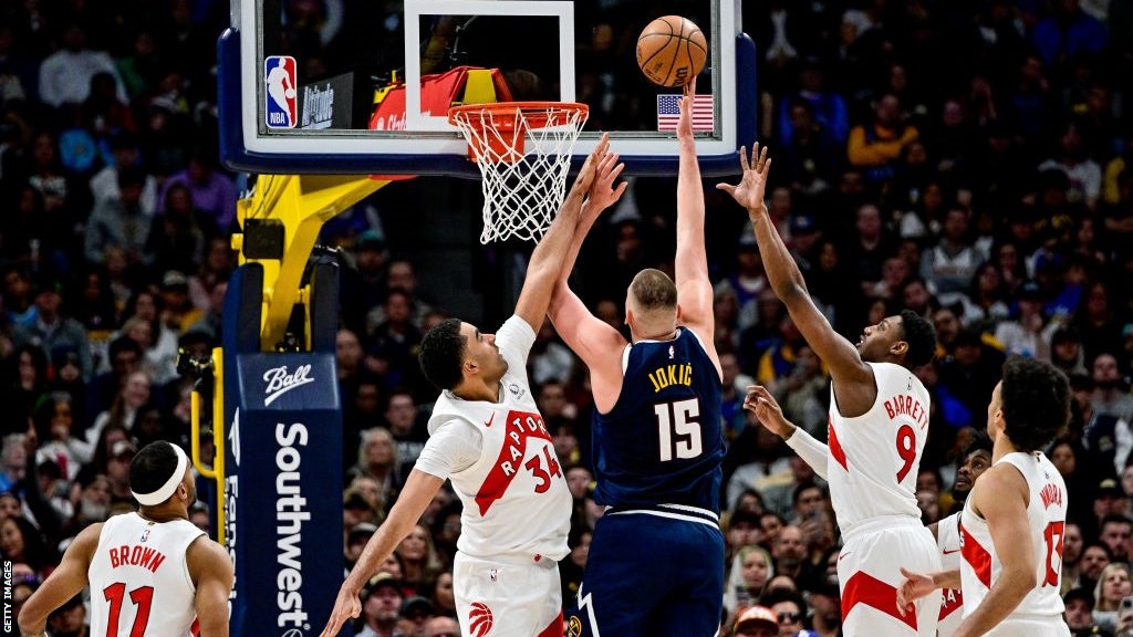 NBA: Nikola Jokic leads Denver Nuggets to comeback win against Toronto Raptors - BBC Sport