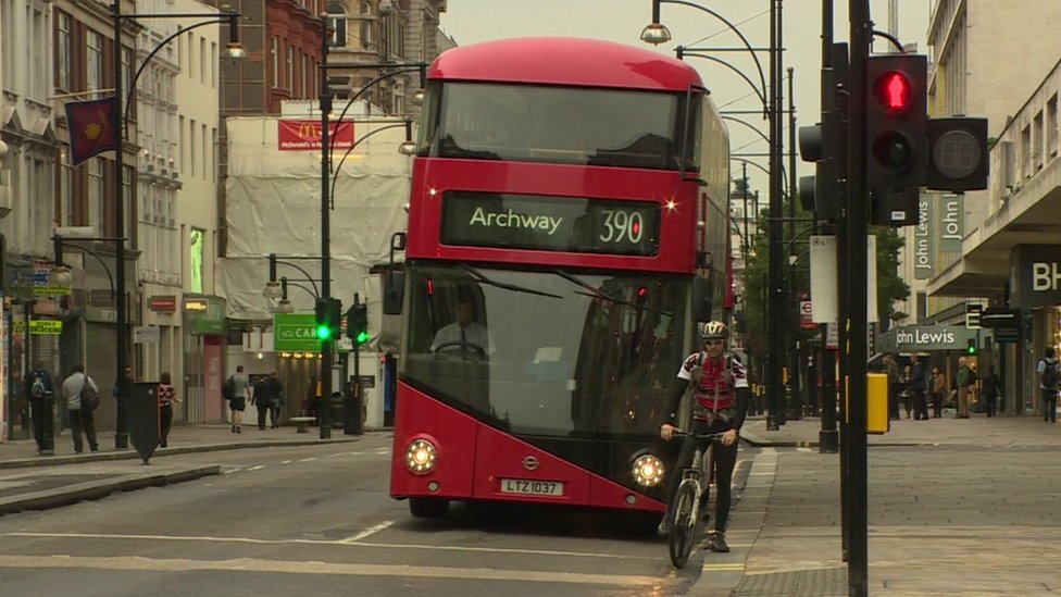 Should cyclists be able to go through red lights? BBC News