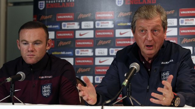 England's Wayne Rooney and Roy Hodgson