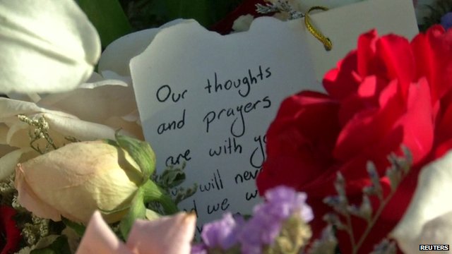 Close up of tribute to victims of Tunisia beach attack