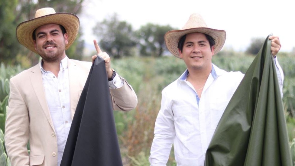 Adrian Lopez Velarde and Marte Czarez posing with the cactus leather