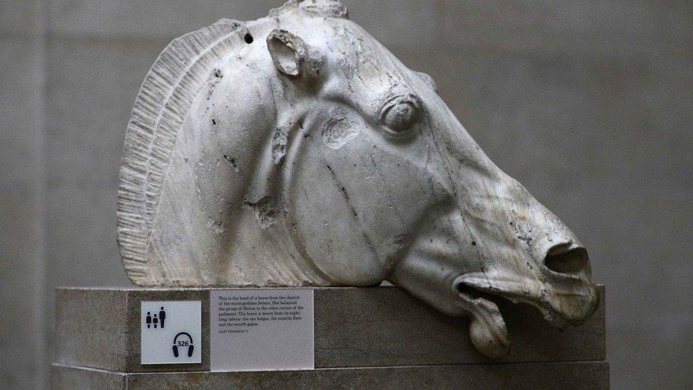 Head of a horse of Selene from the east pediment of the Parthenon. The Parthenon Marbles, are a collection of stone objects, inscriptions and sculptures, also known as the Elgin Marbles, displayed at the British Museum in London