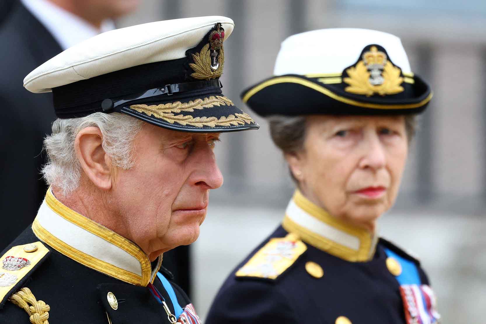 King Charles III and Princess Anne stand in uniform before the service 