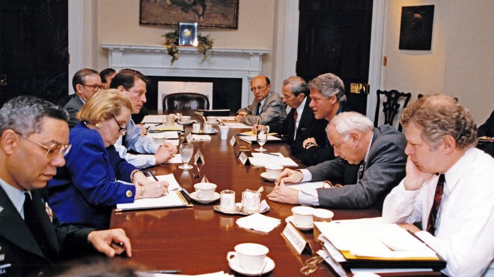American politician US President Bill Clinton (third right) meets with his national security team in the Roosevelt Room of the White House, Washington DC, May 1, 1993. Pictured are, from left, Chairman of the Joint Chiefs of Staff US Army General Colin L Powell, US Ambassador to the United Nations Madeleine Albright, Vice President Al Gore, Deputy White House Press Secretary for Foreign Affairs and Senior Director for Public Affairs of the National Security Council David Johnson, US Secretary of State Warren Christopher, Clinton, and US Secretary of Defense Les Aspin, and National Security Advisor to the Vice President Leon Fuerth