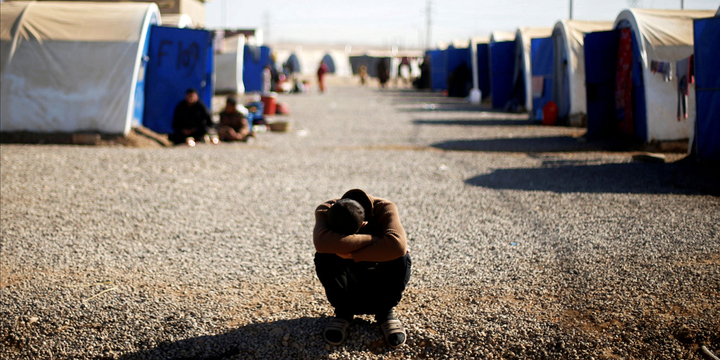 Boy in a displacement camp outside Mosul