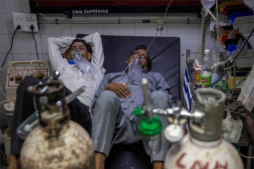 Patients suffering from the coronavirus disease (COVID-19) get treatment at the casualty ward in Lok Nayak Jai Prakash (LNJP) hospital, amidst the spread of the disease in New Delhi,