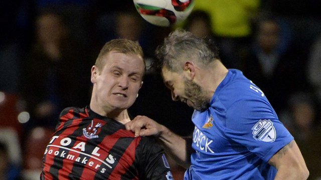 Action from Crusaders against Glenavon at Seaview