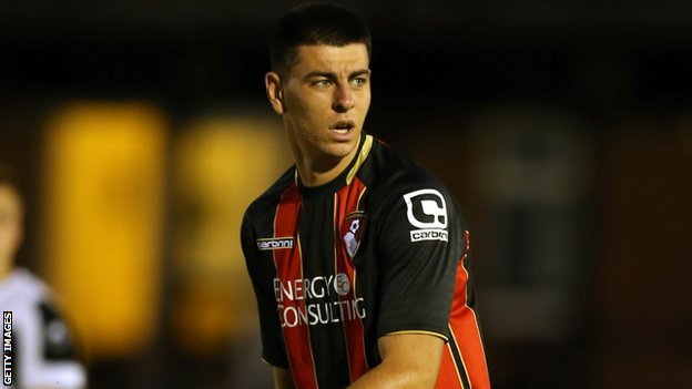 BBC Sport - Torquay United sign Bournemouth pair Quigley & Carmichael