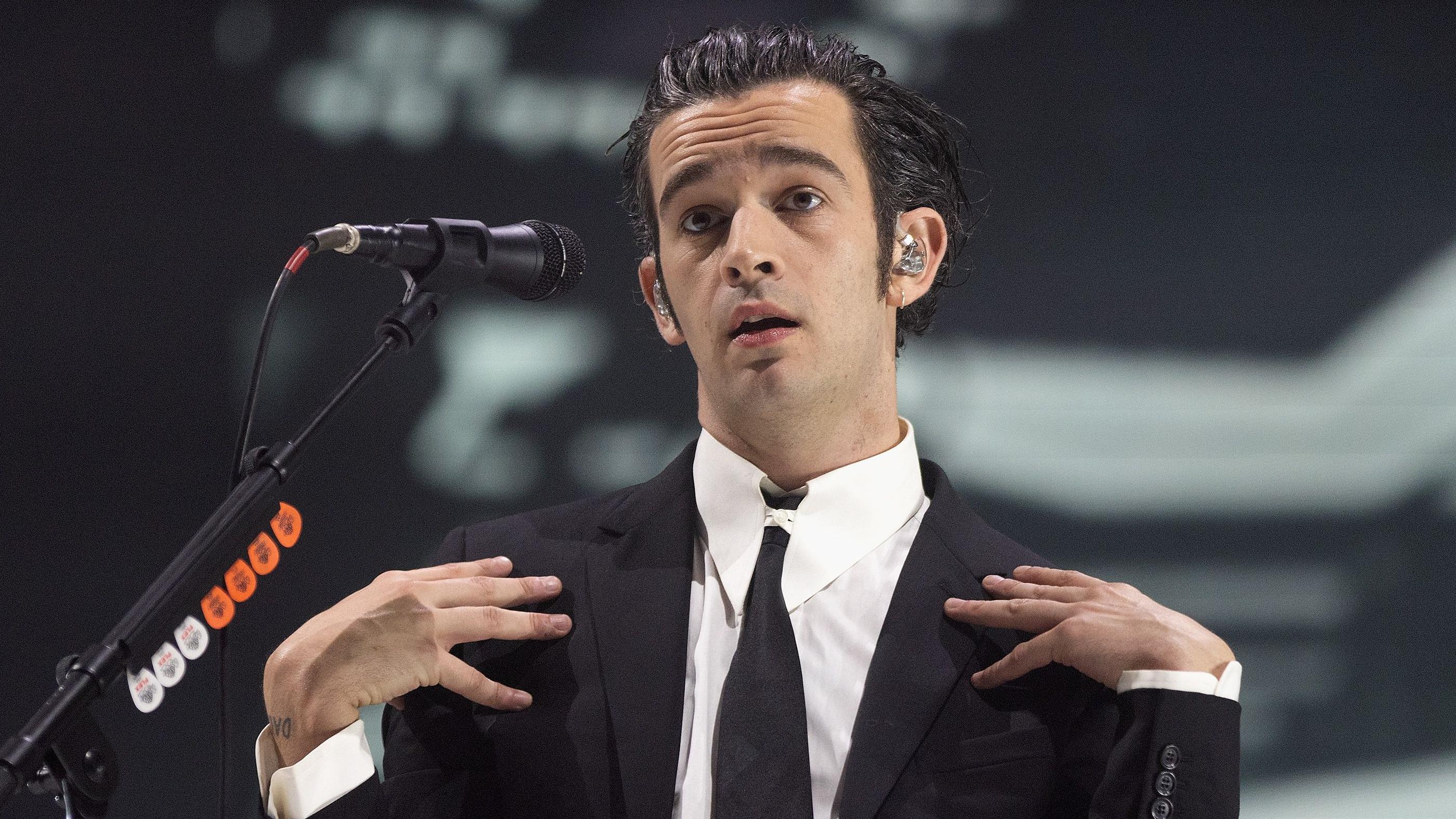 The 1975: On-stage kiss should not make band members liable, court