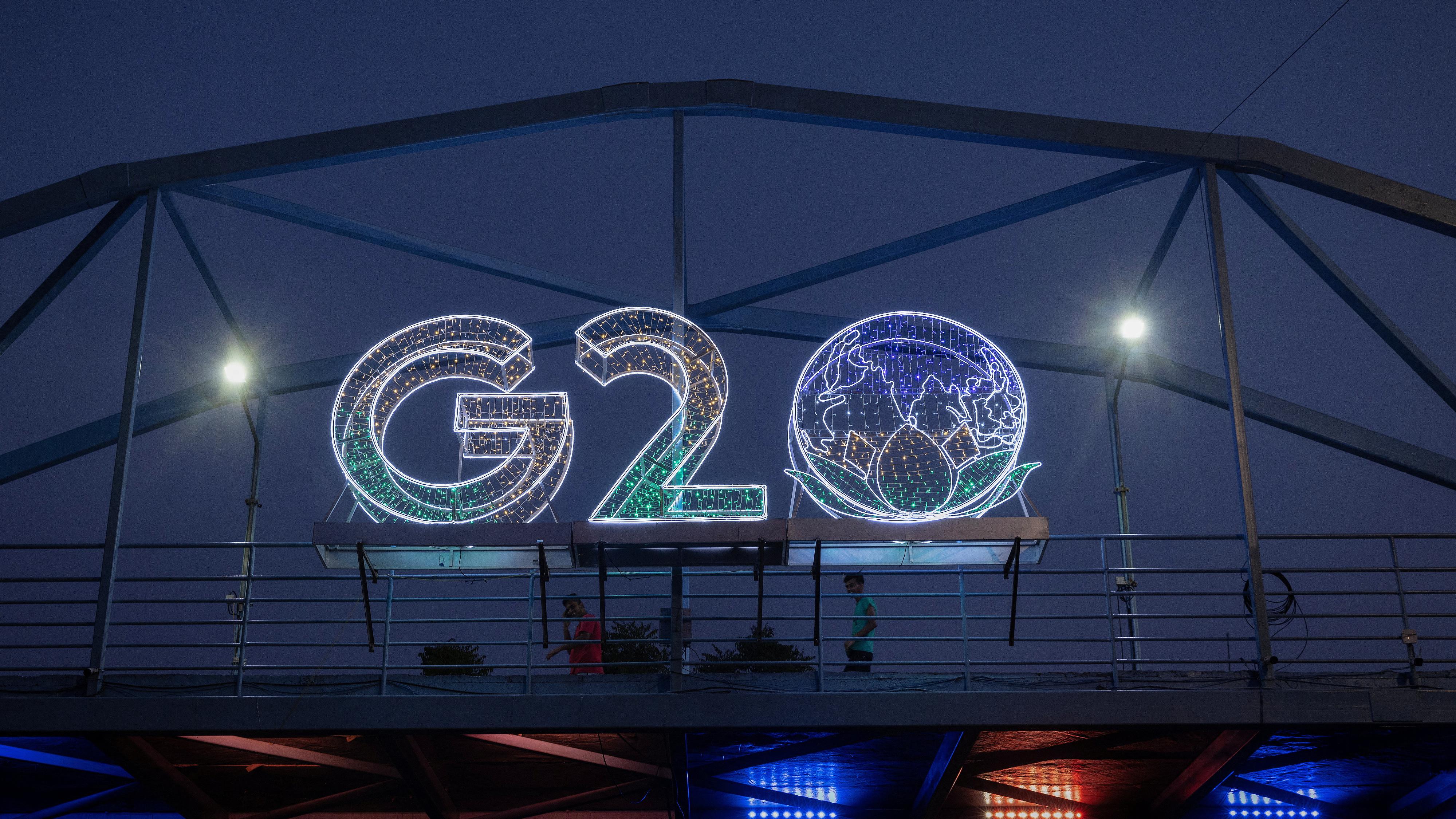 G20 logo installed on a pedestrian bridge in front of the main venue of the summit in New Delhi, India, August 25, 2023.