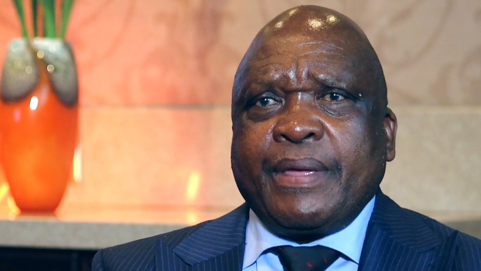 A head and shoulders shot of Dr Joe Phaahla.