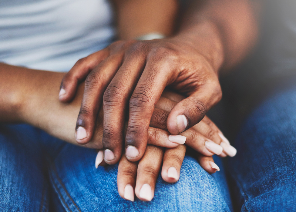 Close-up of a couple holding hands