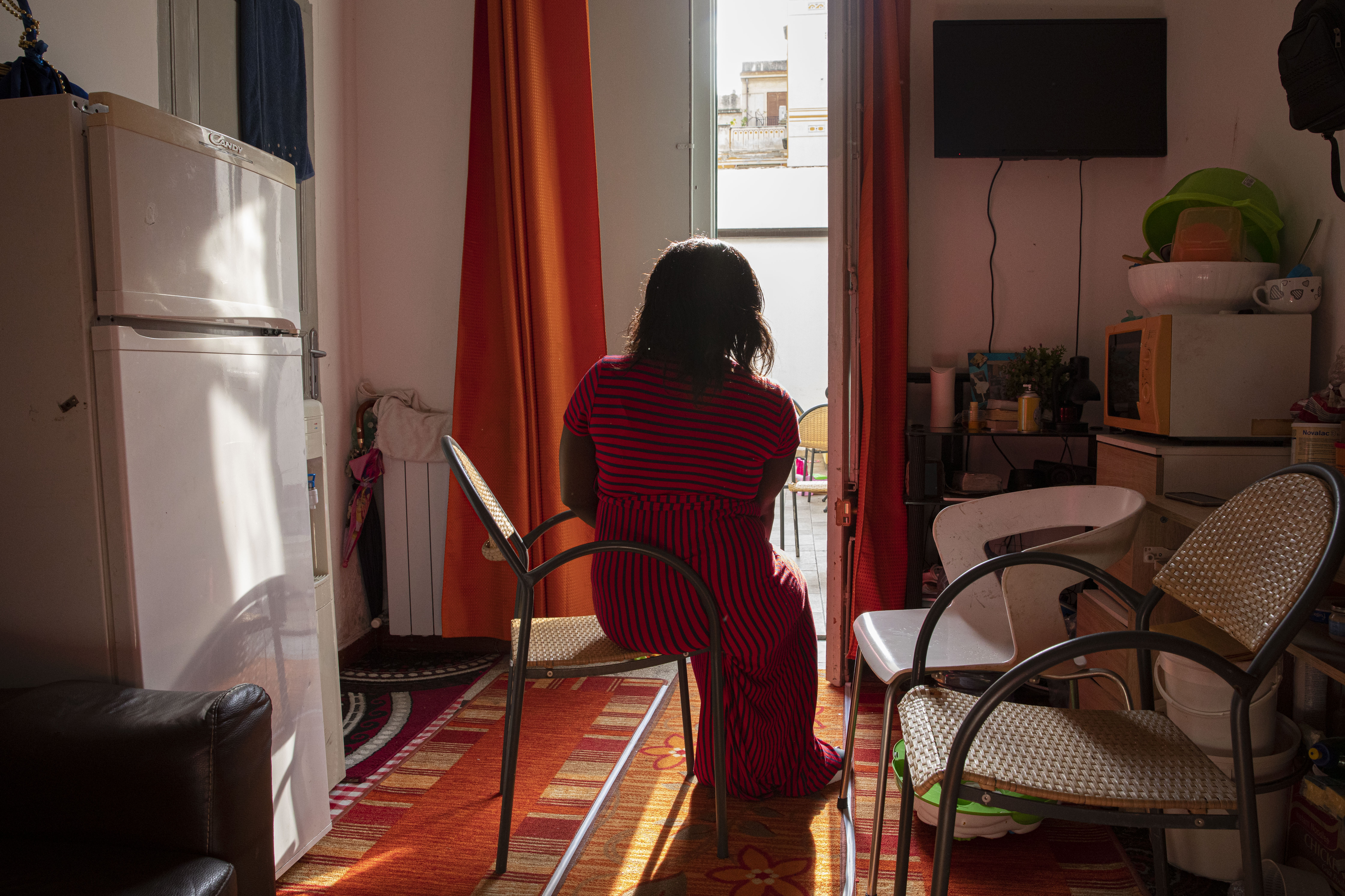 A woman looking out of the window