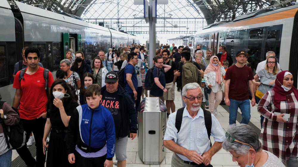 Passengers leave trains at Dresden main station pm 4 June 2022