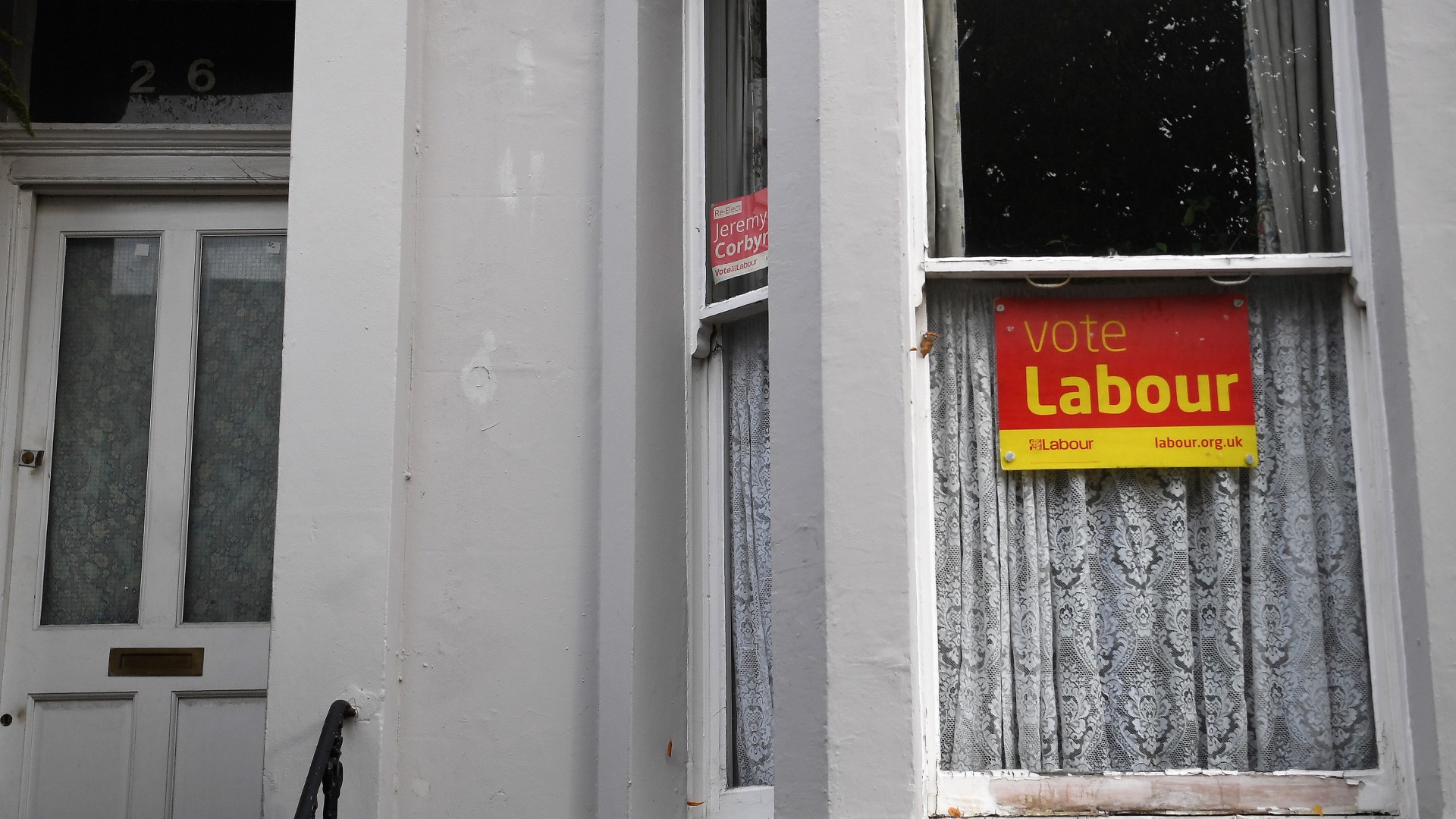 Vote Labour banner in front window