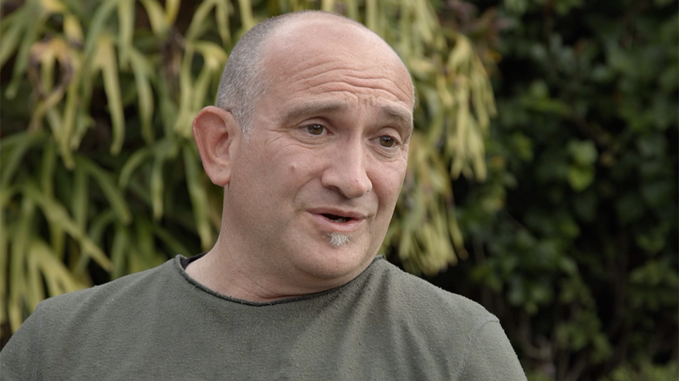 A head and shoulders image of Stuart Dods wearing a grey T-shirt.