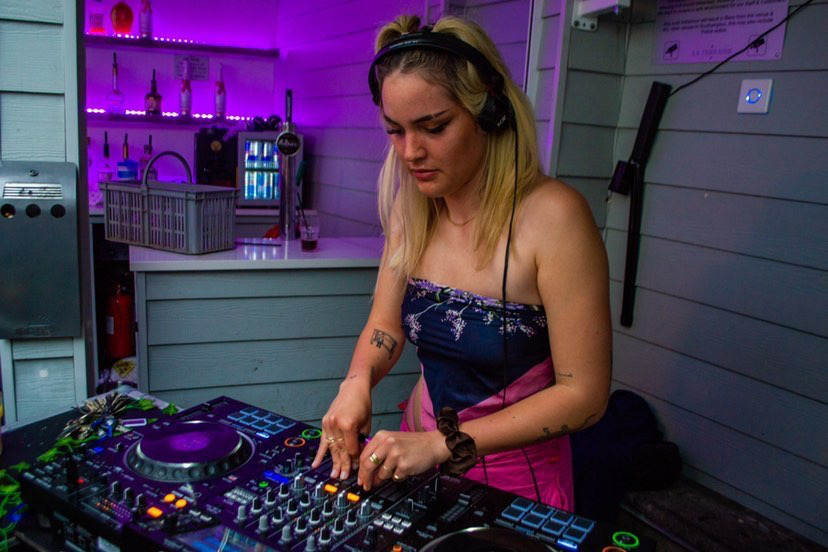 female djing in club