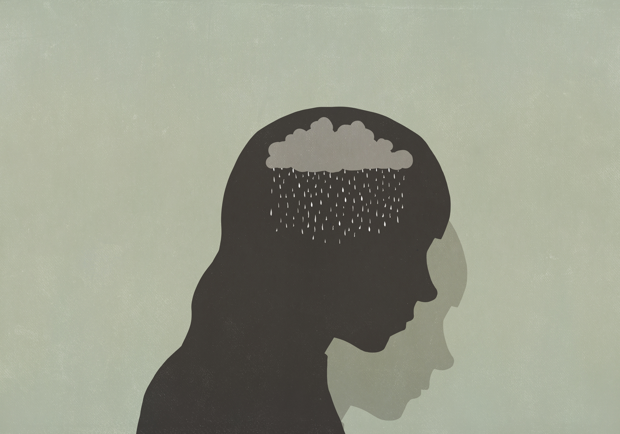 Ilustración de una silueta con un cerebro con una nube y lluvia. 
