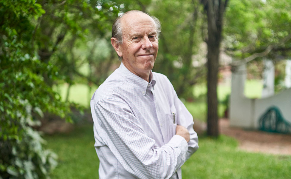 David Coltart, with arms folded