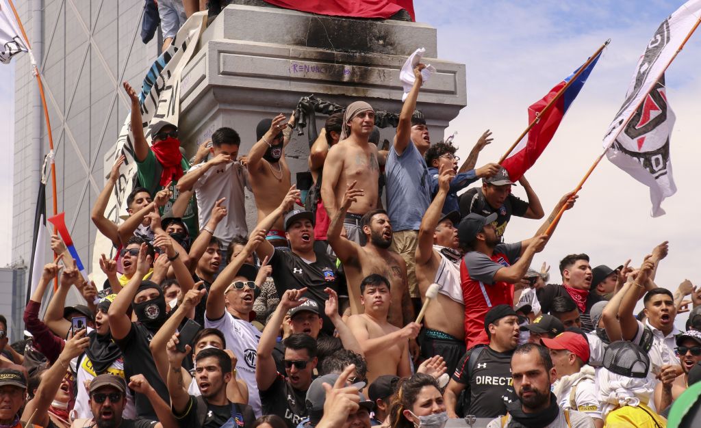 rotesters gather in Santiago to inflict improvements in the constitution and resignation of President Sebastian Pinera on the fifth day of social riots for increases in public tran