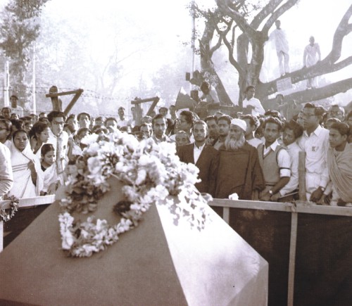 21 February 1956: Abul Barkat's sister, sister-in-law and mother standing in front of the foundation stone of the central Shaheed Minar, Dhaka