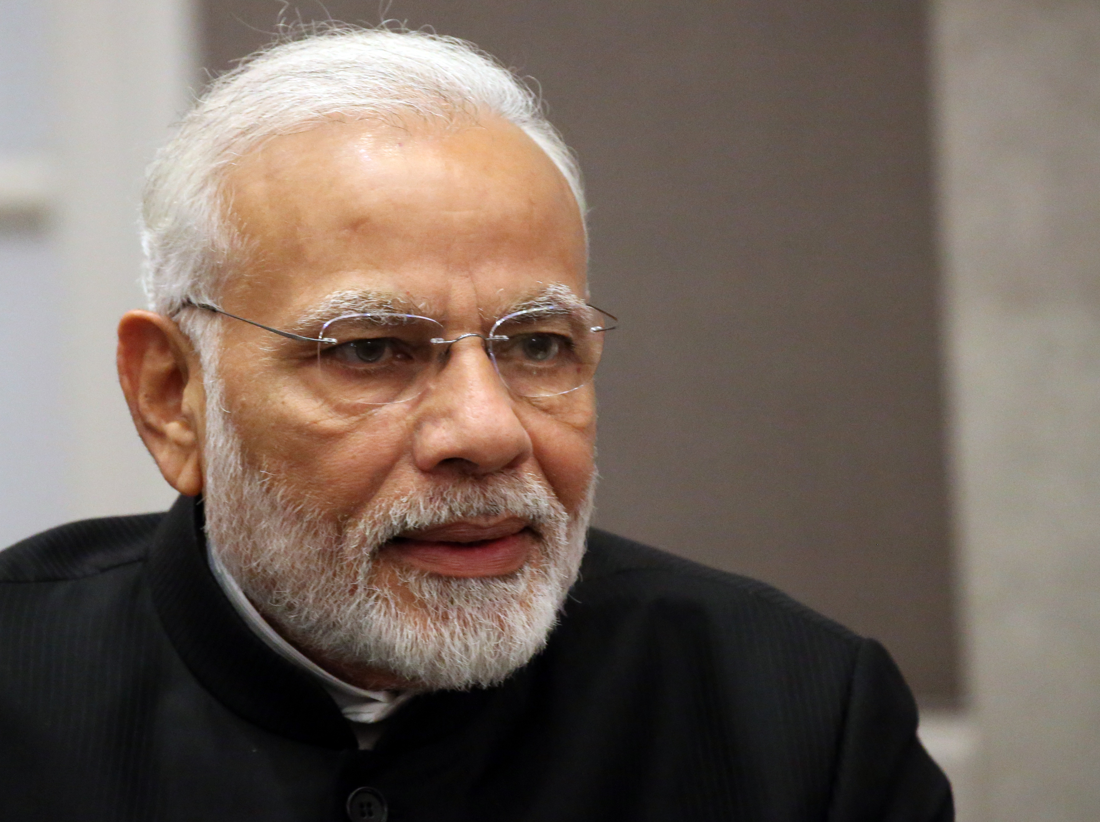 India's Prime Minister Narendra Modi alongside claim of country free of open defecation
