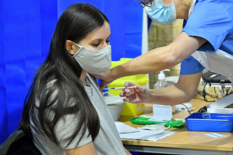 Person being vaccinated in Cardiff