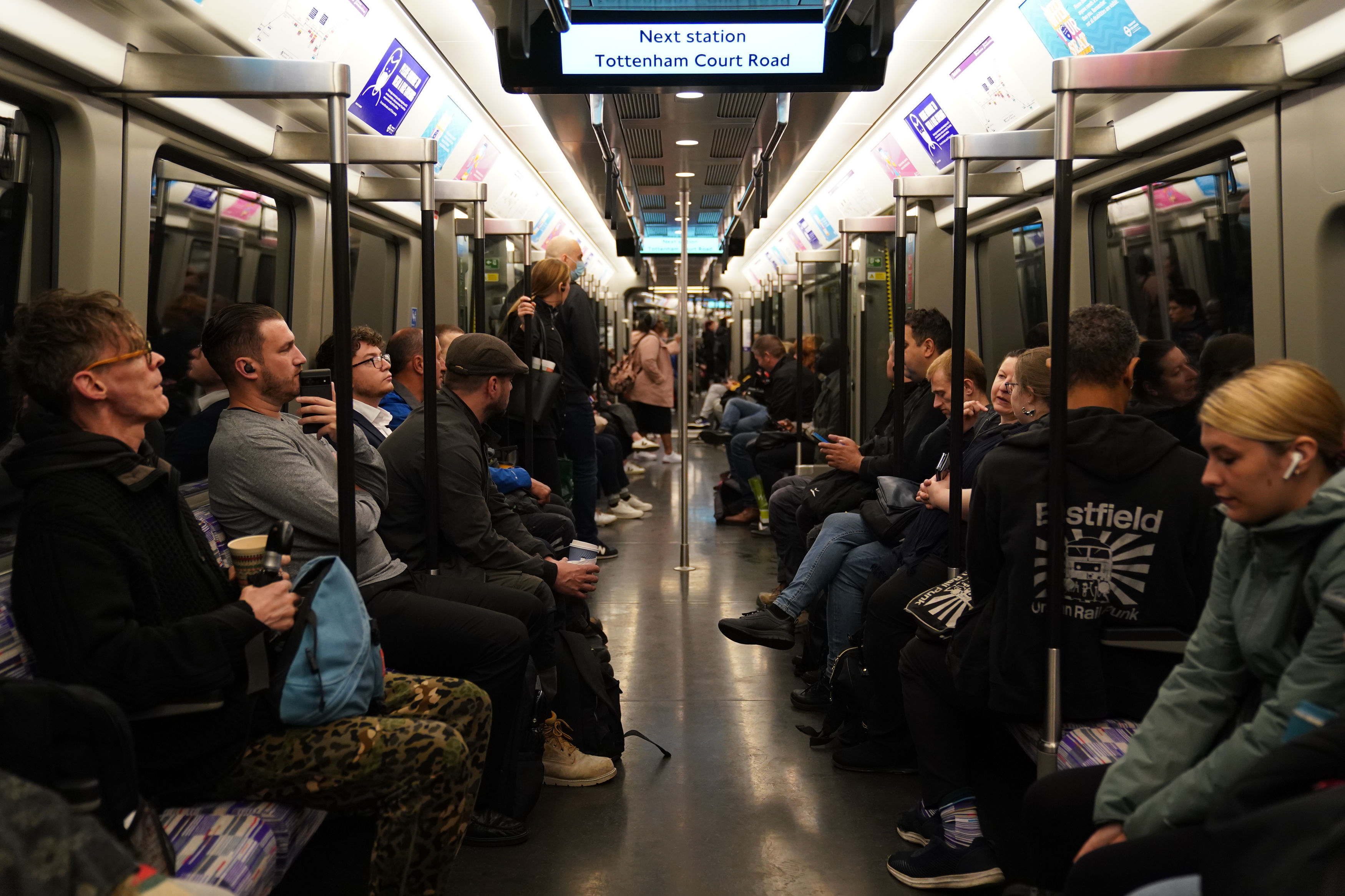 File image of passengers sitting in an Elizabeth line carriage as it approaches Tottenham Court Road station