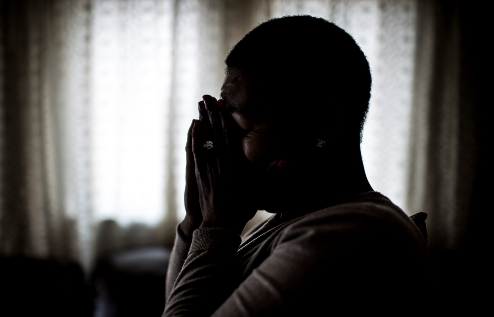 South African chef Nthabiseng Mabuza (pseudonym), 35 years old, cries at home on July 7, 2017, in Vosloorus, a middle-class township east of Johannesburg, after telling about her r