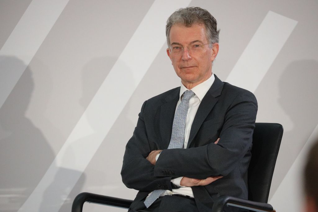 Christoph Heusgen sits in a chair with his arms crossed at a discussion event on March 18, 2022 in Berlin, Germany