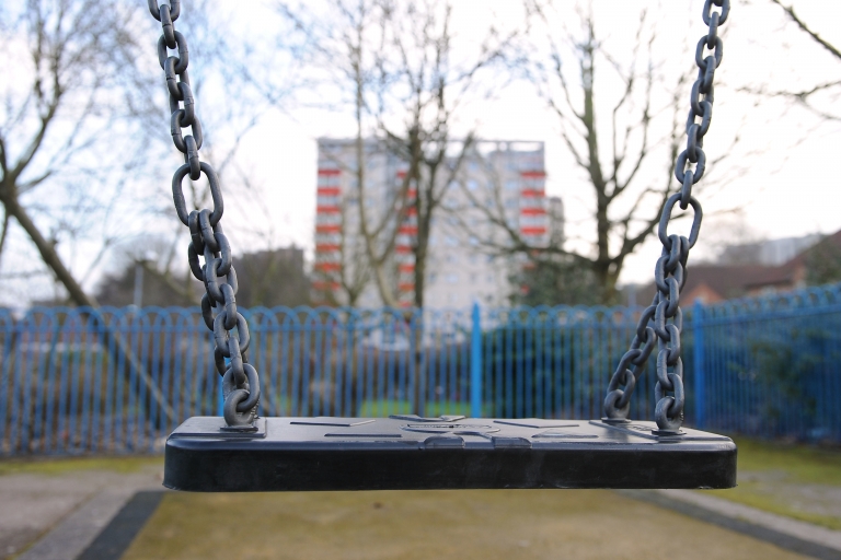 Empty swing on playground