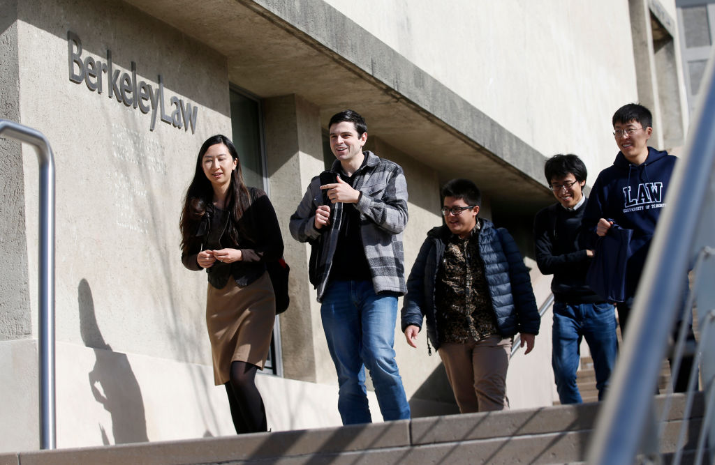 University students, some Chinese, on the steps of Berkeley University in California, USA.