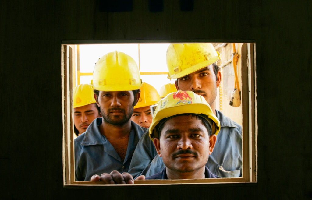 Construction workers on a new sky scrapper in Qatar