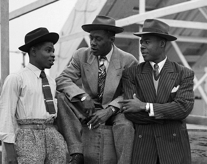 Three men onboard Empire Windrush