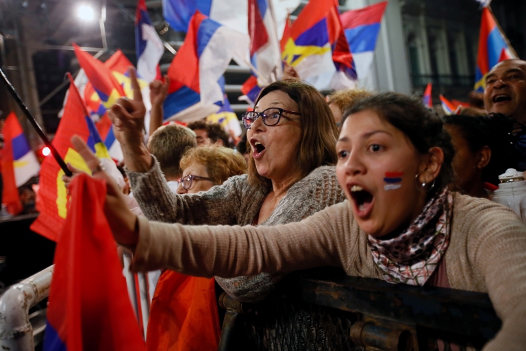 Supporters of presidential candidate Daniel Martínez celebrate in Montevideo