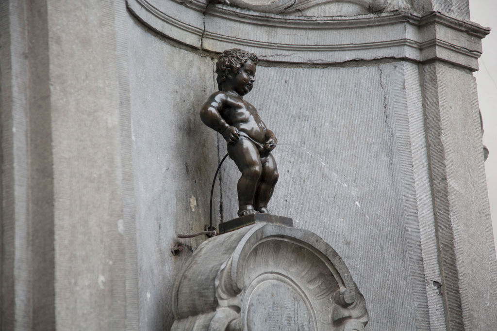 Manneken Pis, a estátuabr4bet comum garoto urinando no centrobr4bet comBruxelas.