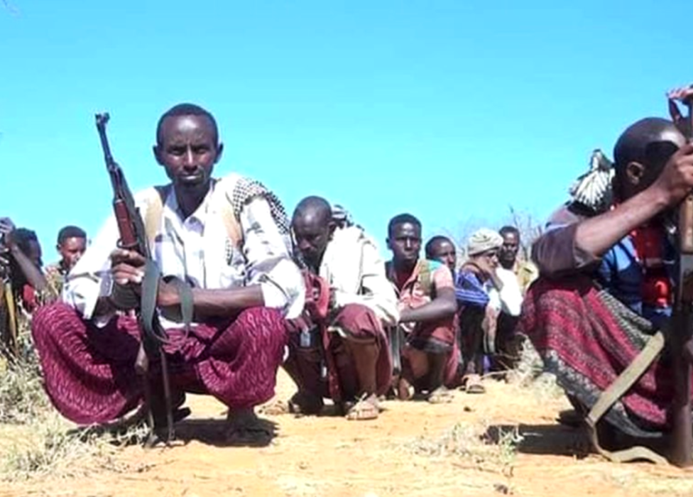 Fighters in sarongs, pictured in Bakool in Somalia in 2019