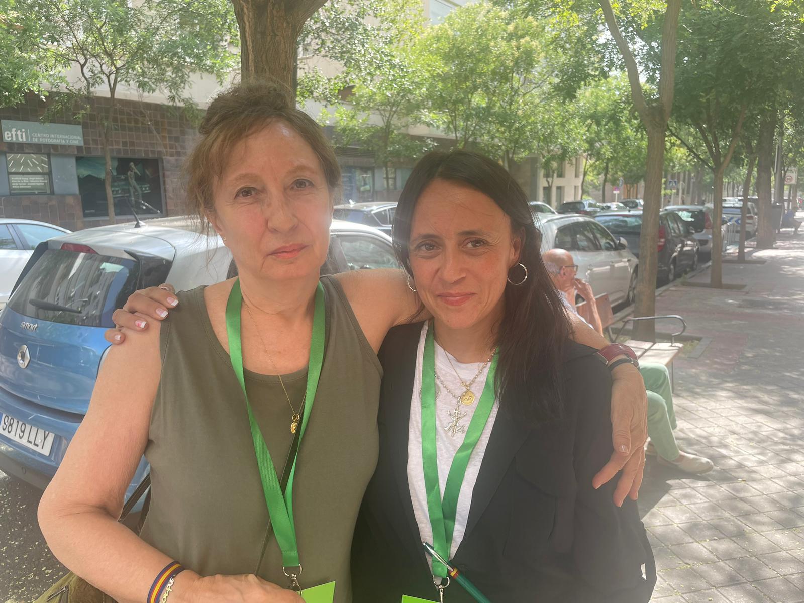 Vox voters Maite Serrano (L) and Nadia Alsani 