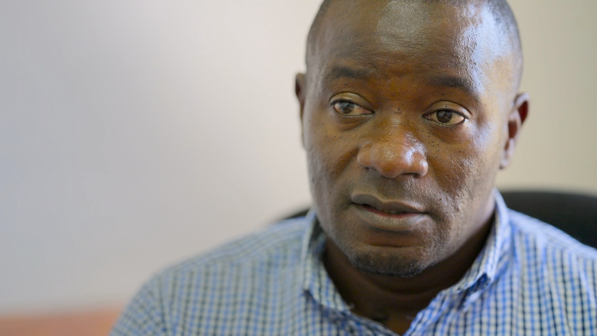 A head and shoulders shot of Christopher Mhone