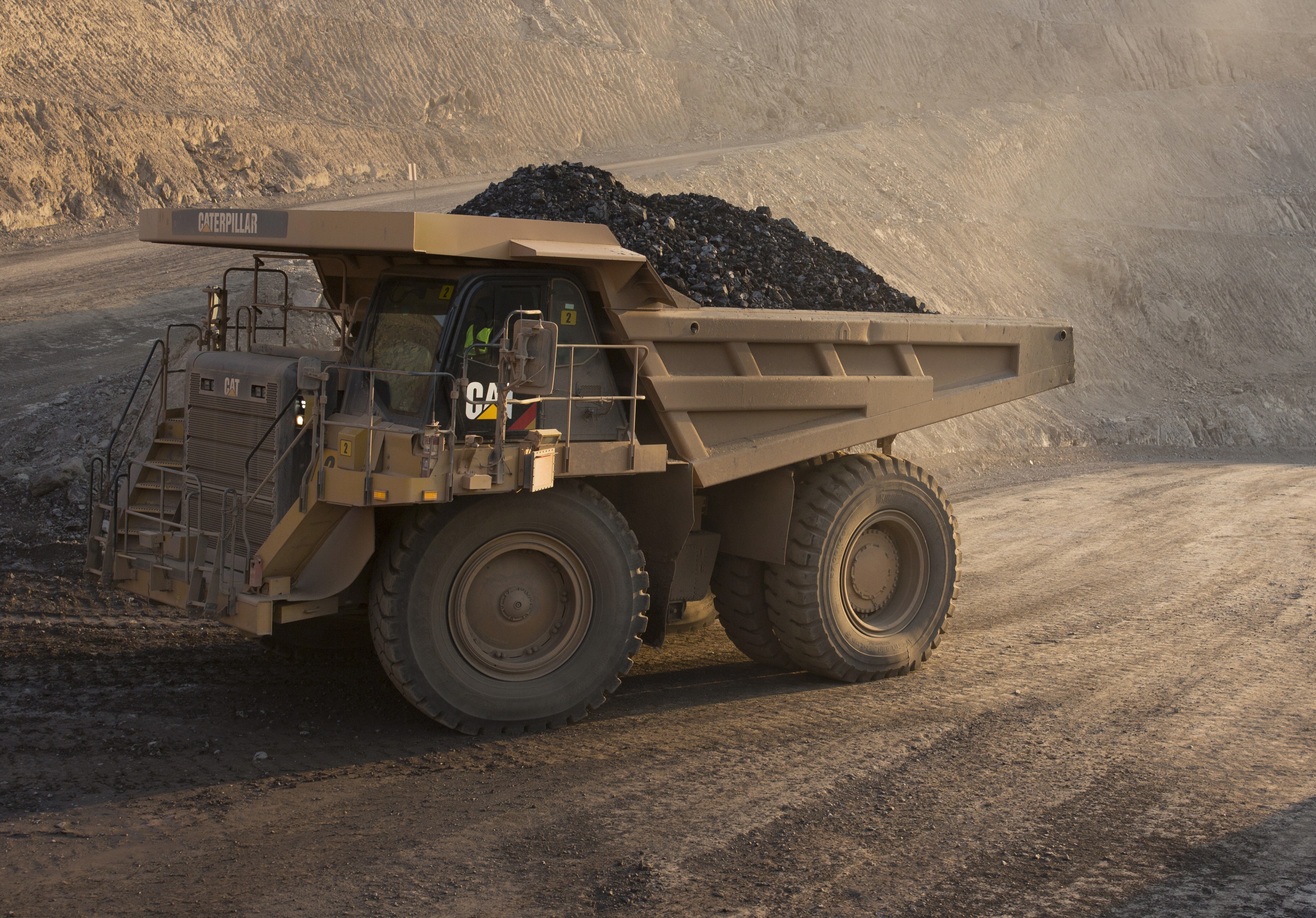 A lorry with rocks in its load