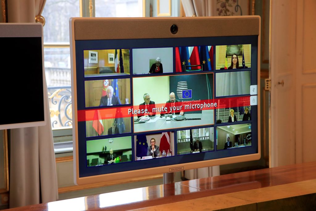 A screen shows a virtual European Commission meeting