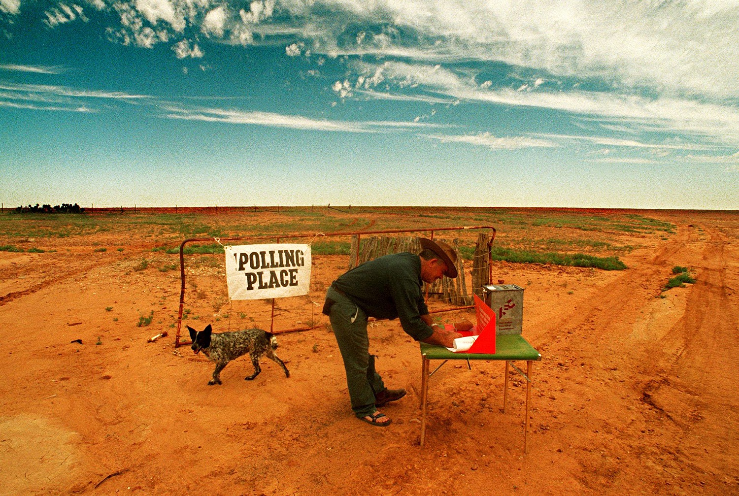 A farmer votes in an empty field on a remote farm in NSW, Australia